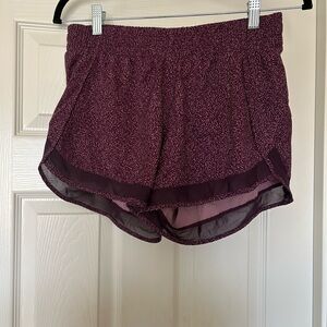 Athleta Running Shorts, size Small, EUC, inseam is 4”, purple print